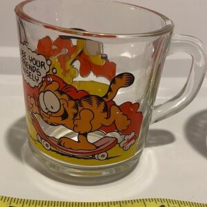 2 McDonald's Garfield Skateboard Glass Mug - Orange and Yellow Artwork